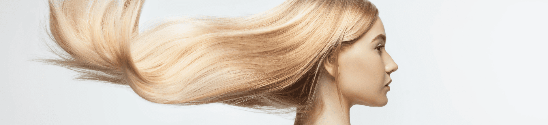 beautiful-model-with-long-smooth-flying-blonde-hair-isolated-white-studio-background-young-caucasian-model-with-well-kept-skin-hair-blowing-air_1